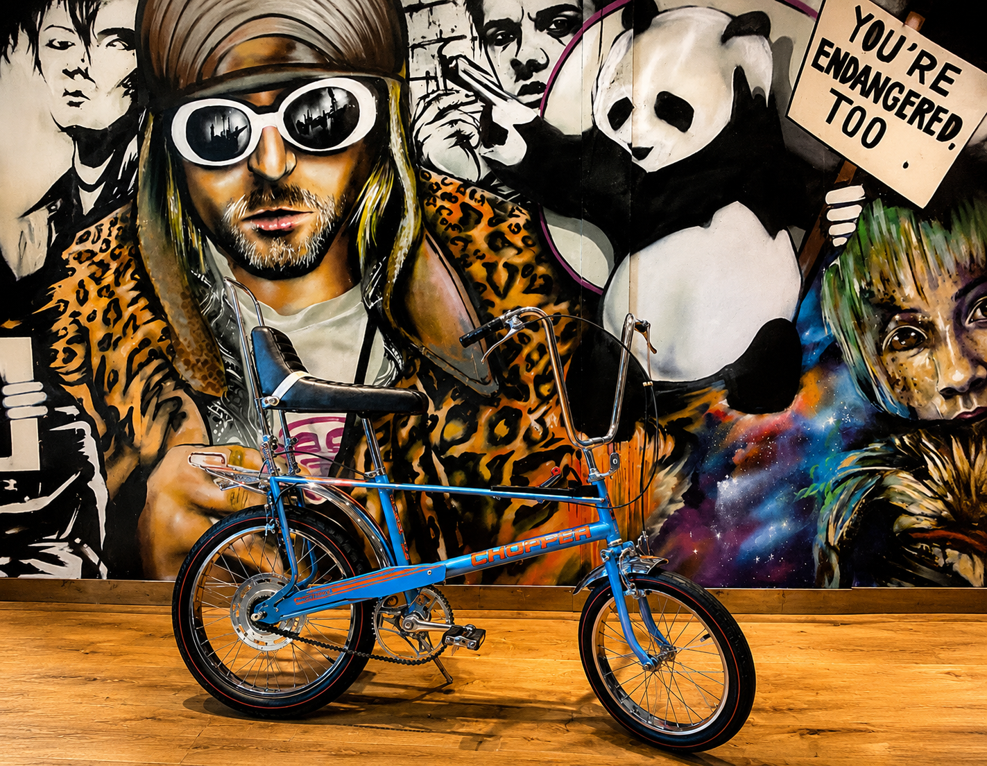 Commercial mural feature wall with custom artwork and display motorcycle