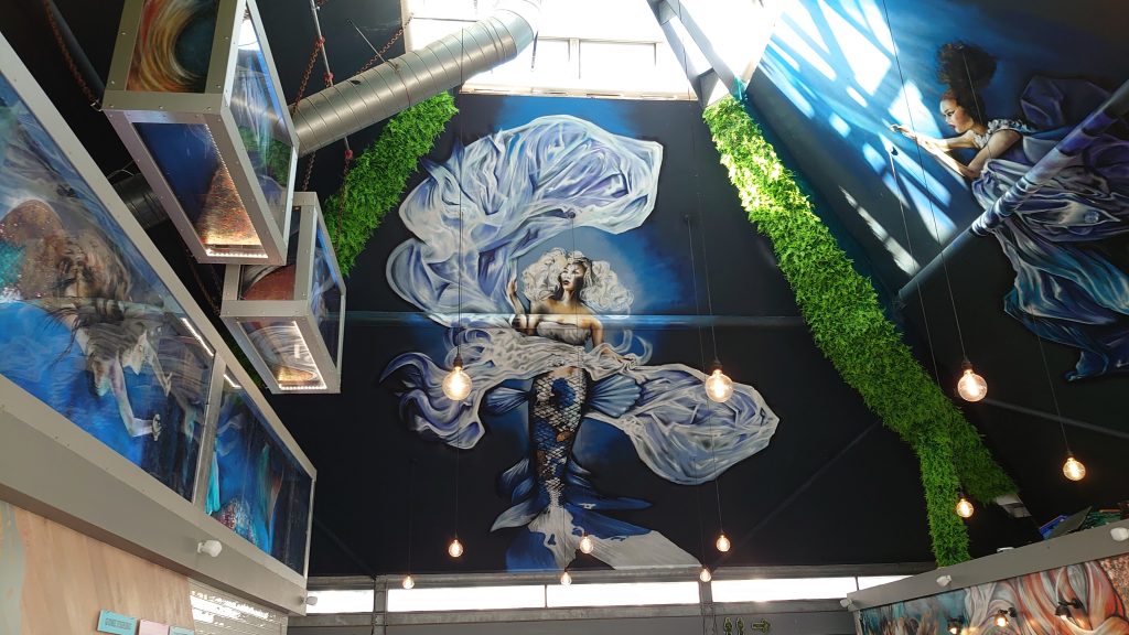 restaurant mural artist in devon mermaid ceiling painting by urban gypset