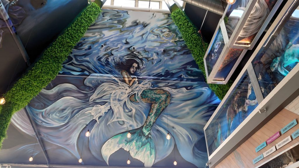 Restaurant artist in devon urban gypset large painted ceiling mural of a mermaid