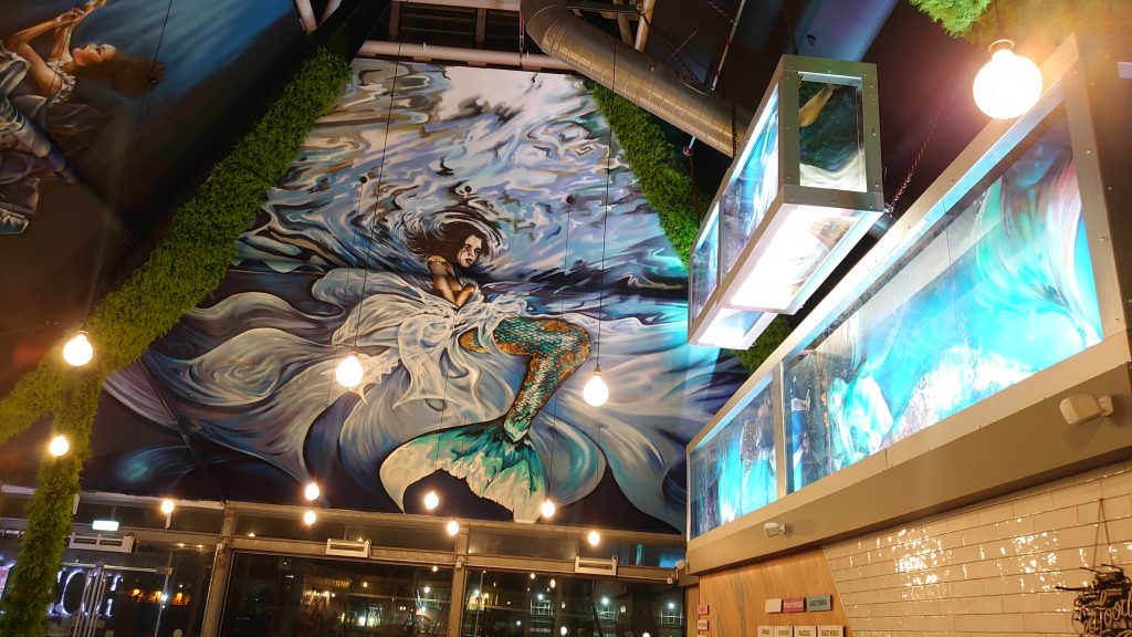 restaurant mural artist devon painted tanks and a ceiling urban gypset