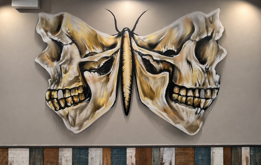Vintage-inspired moth mural inside Claremont Social Tap House Shrewsbury